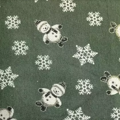 Vánoční gobelínová látka sněhulák na zelené š.160 cm